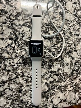 Apple Watch Series 3 Cellular with charger